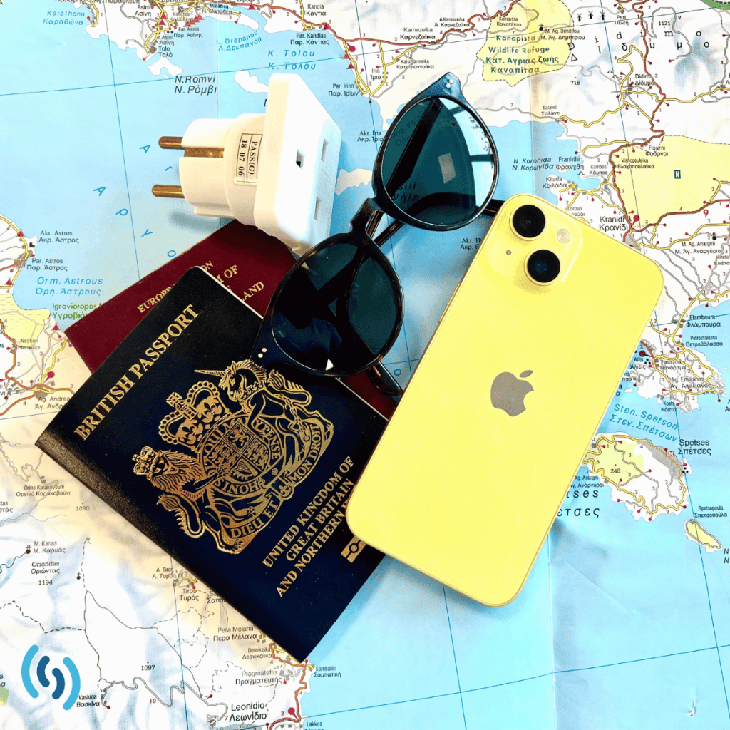 Hi there, are you travelling abroad? This image contains your essential items for travelling - a passport (2 actually), a pair of sunglasses, a travel adapter plug, and a yellow iphone. They are laid rather pleasingly over the top of an actual map. In the bottom left of the image is the blue Simpatico Logo.