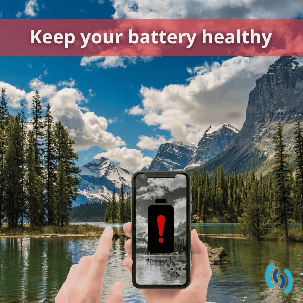 Hello this is an image of a snow tipped mountain scene, with blue cloudy skies above, and in the foreground is a lake with tall conifers growing around the edge. Right at the front of the image a hand holding a mobile phone poised to take a photo of the wonderful scene in front of it - however the battery on the phone appears to have run out (indicated by a red exclamation mark and a black and white screen), so unfortunately the person holding the phone will not be able to take a photo. Across the top of the image on a red banner are the words ‘Keep your battery healthy’ and in the bottom right hand corner is the Simpatico Logo.