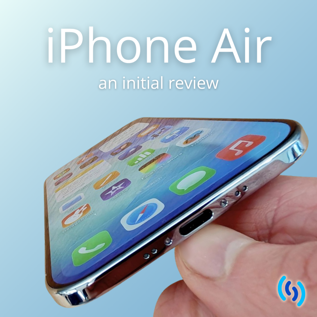 The new iPhone air set at a jaunty angle being held by someone's thumb and forefinger. It is positioned at an angle to the camera so you can see the shiny edges but also how thin it is. On the phone screen you can see all the apps. The background of the image is a pale blue. The text in white reads 'iPhone Air an initial review' Blue Simpatico logo in the bottom right hand corner