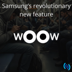 Darkened image of a busy tube train, with people using their mobile phones. In white lettering across the front that says 'Samsung's revolutionary new feature' and WOOW