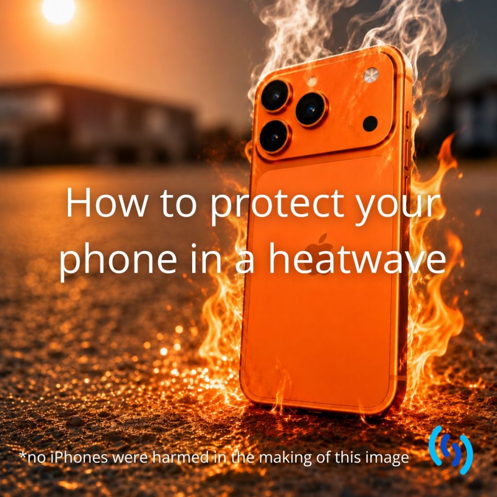 An orange iPhone 17 standing on a sun-heated road, with wisps of steam and flames rising around it against a dark British streetscape. The image illustrates how prolonged exposure to high temperatures can affect business mobile phones during a UK heatwave. As you have guessed it is AI generated and we did not actually burn a phone 😊